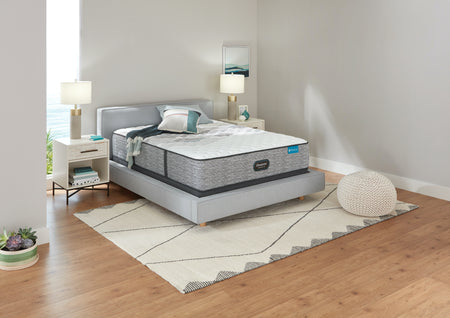 A bedroom with a Simmons Beautyrest mattress in the bed.