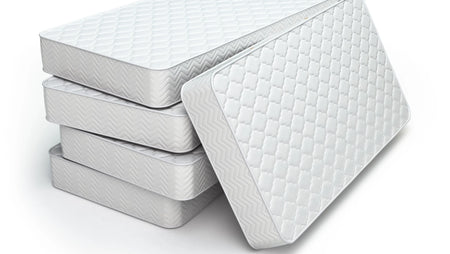 Stack of generic Twin size mattresses