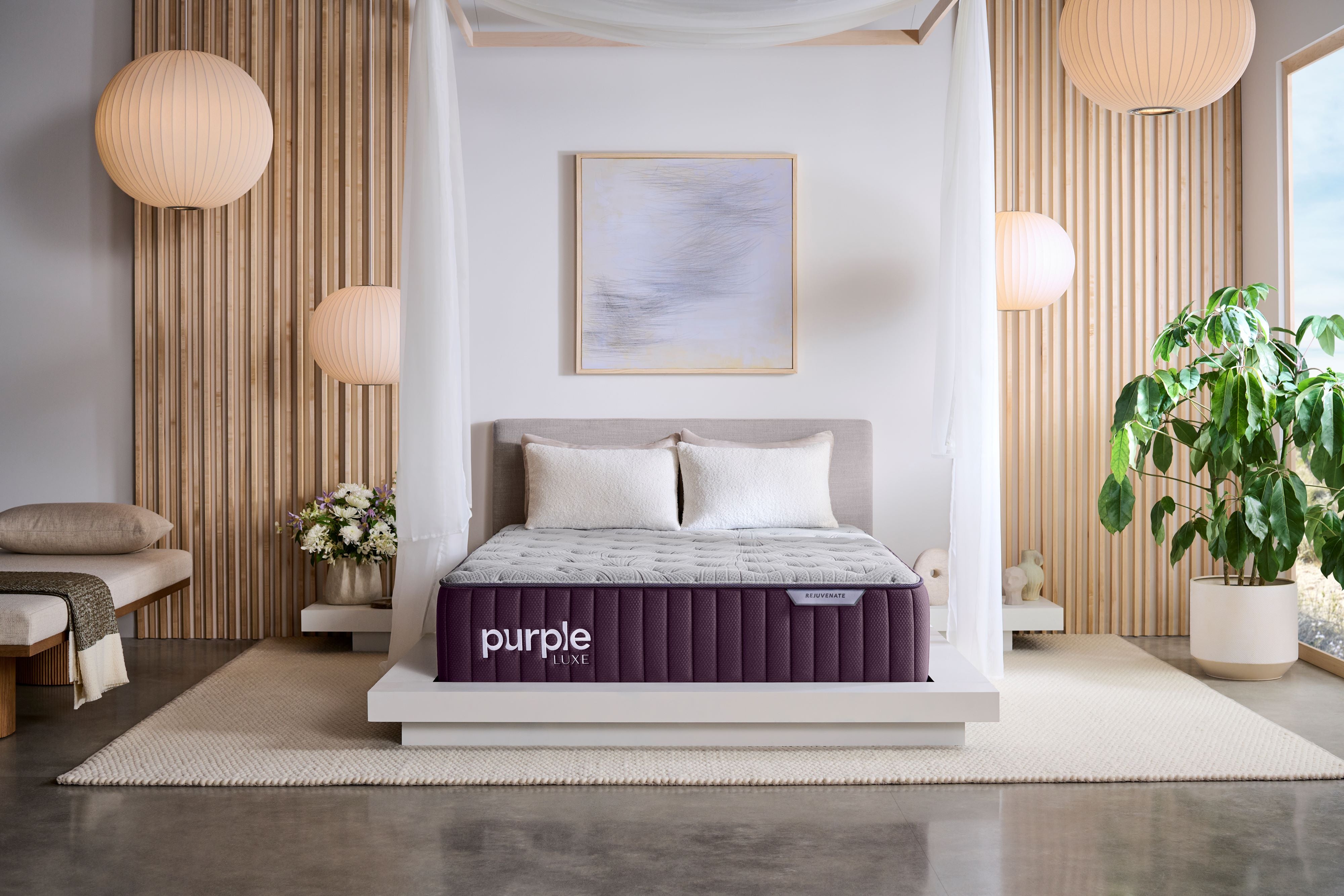 Purple Luxe Rejuvenate Mattress in a beautiful room seen from the front